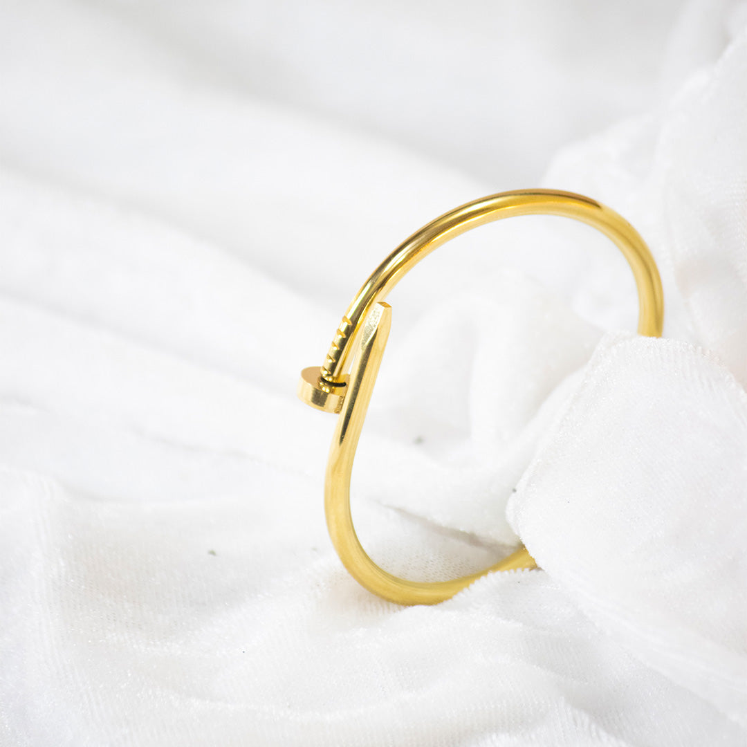 Sleek Nail-Inspired Gold Cuff