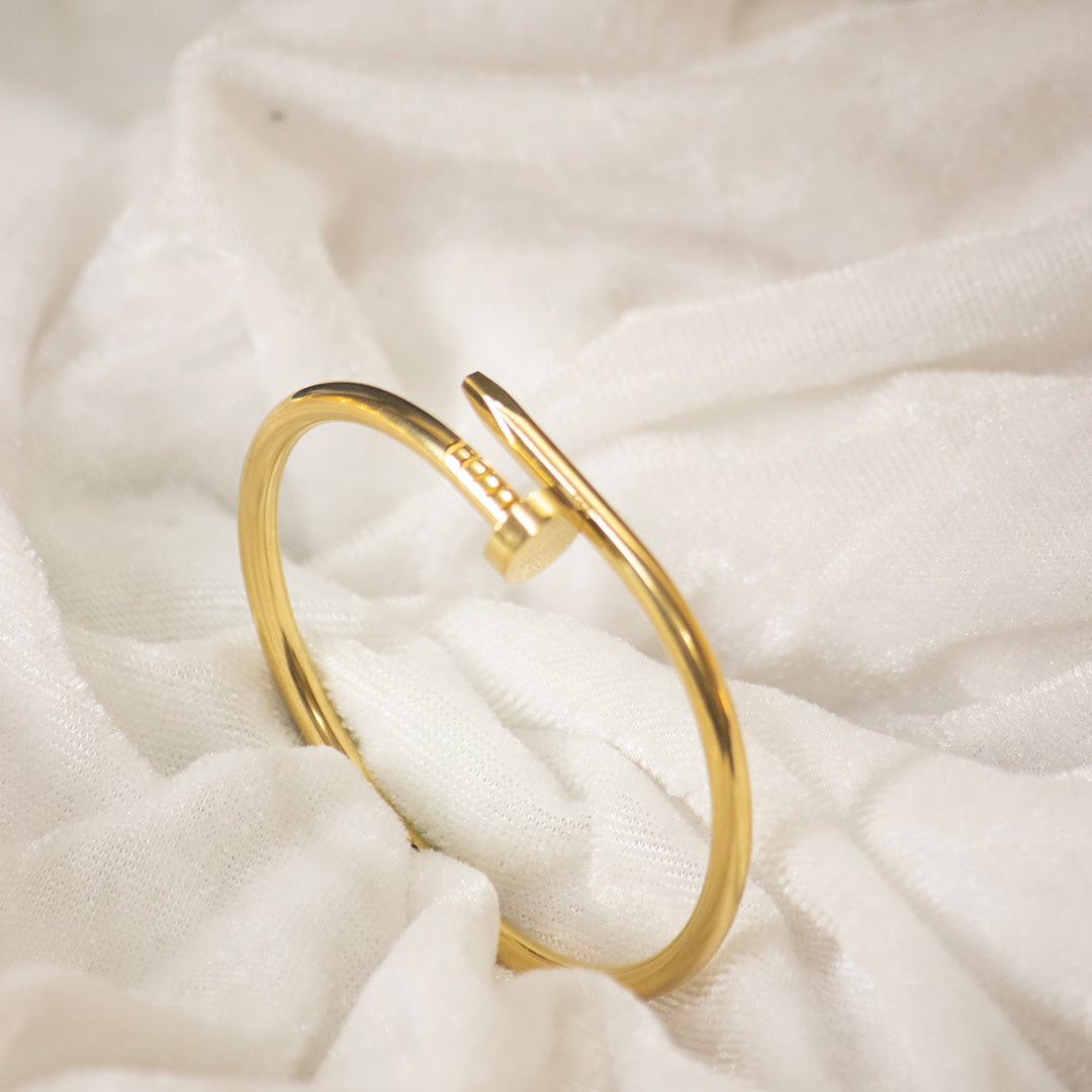 Sleek Nail-Inspired Gold Cuff