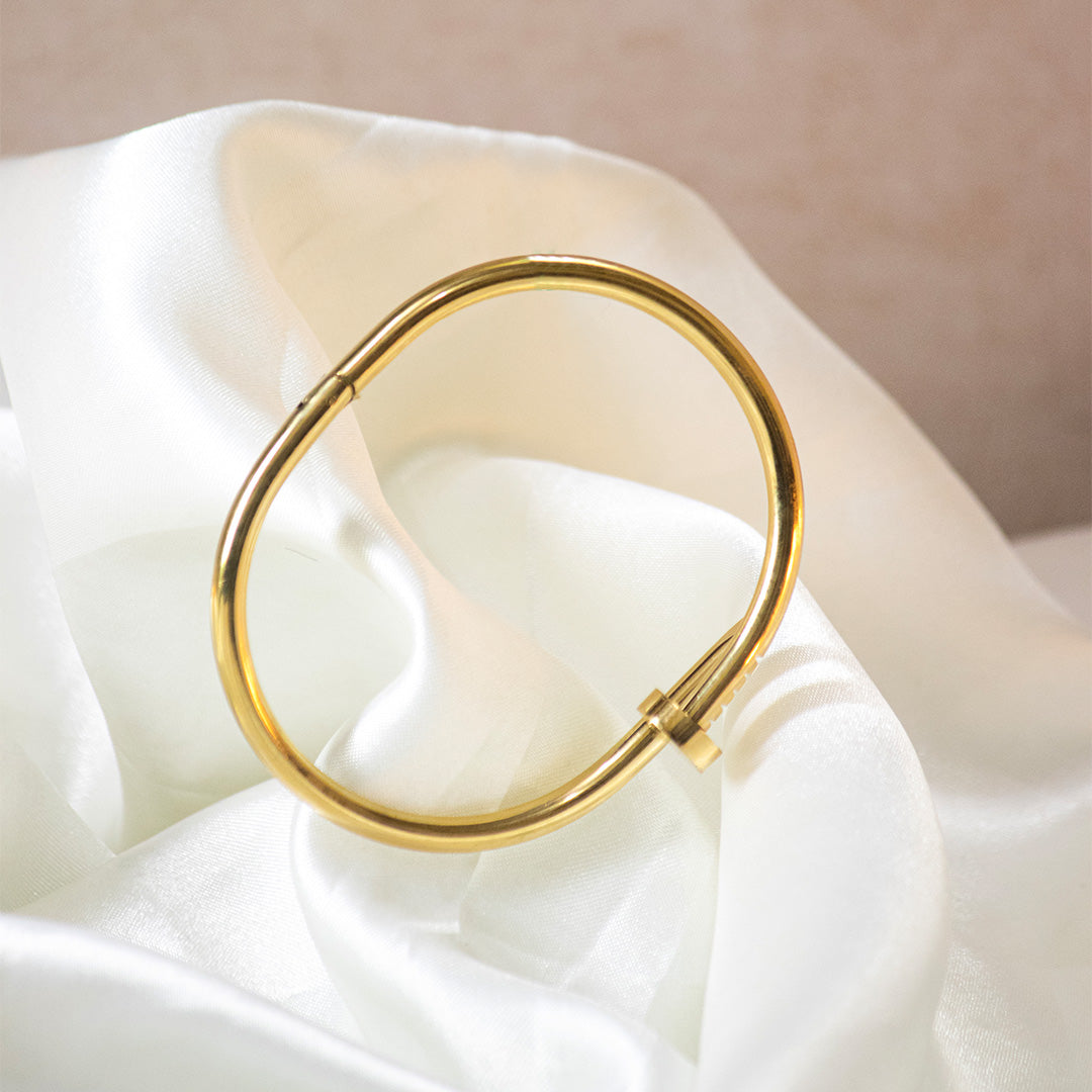 Sleek Nail-Inspired Gold Cuff
